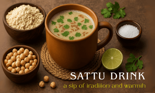A rustic earthen mug filled with frothy Sattu drink garnished with fresh coriander leaves and roasted cumin seeds, surrounded by a wooden bowl of Sattu flour Crafts of Bihar